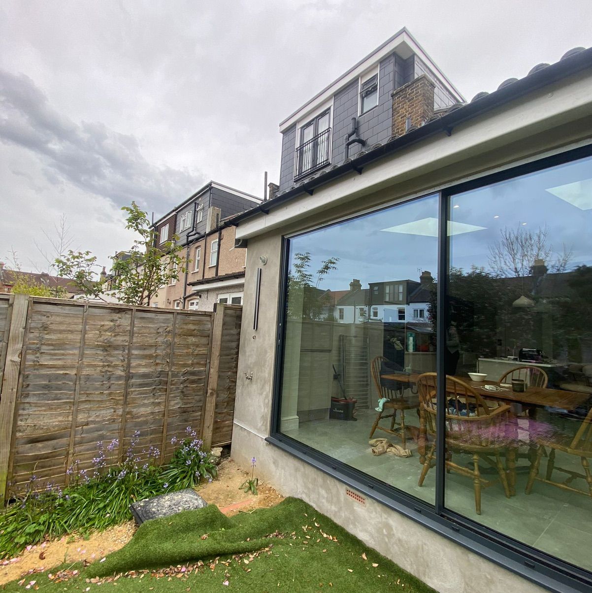 Modern single-storey extension with large glass doors